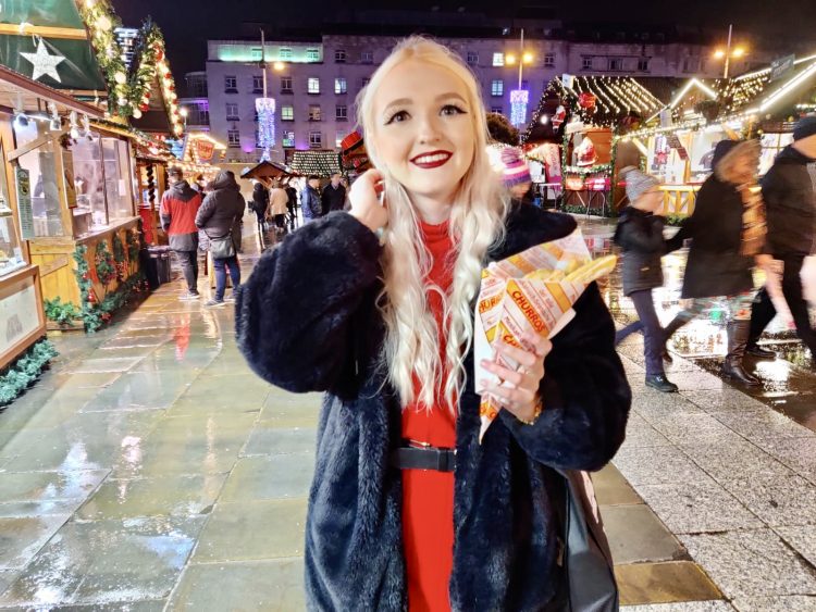 Decorative image of Flossie with churros at Leeds Christmas Market